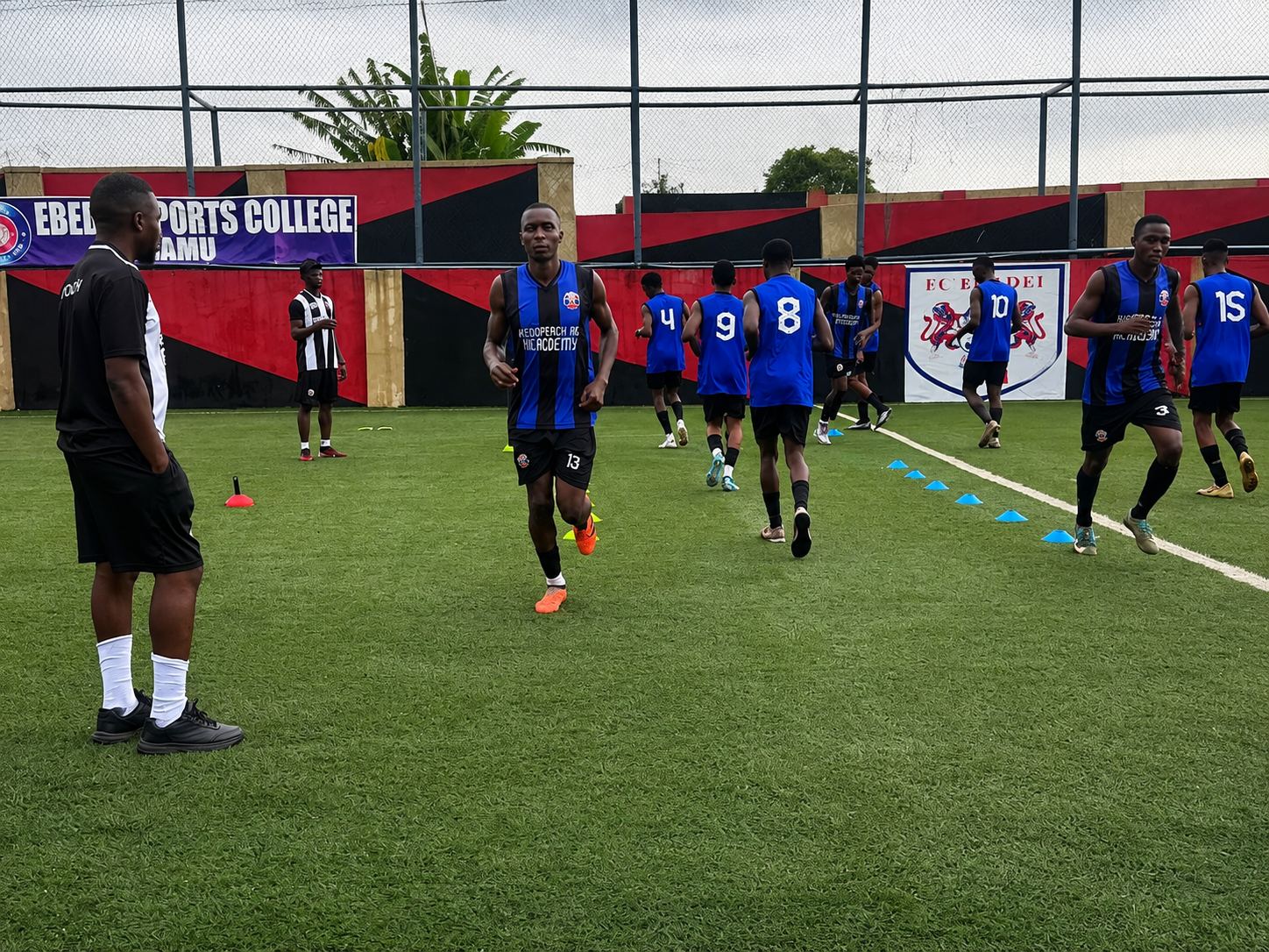 KEDOPEACH Academy players running through a technical drill